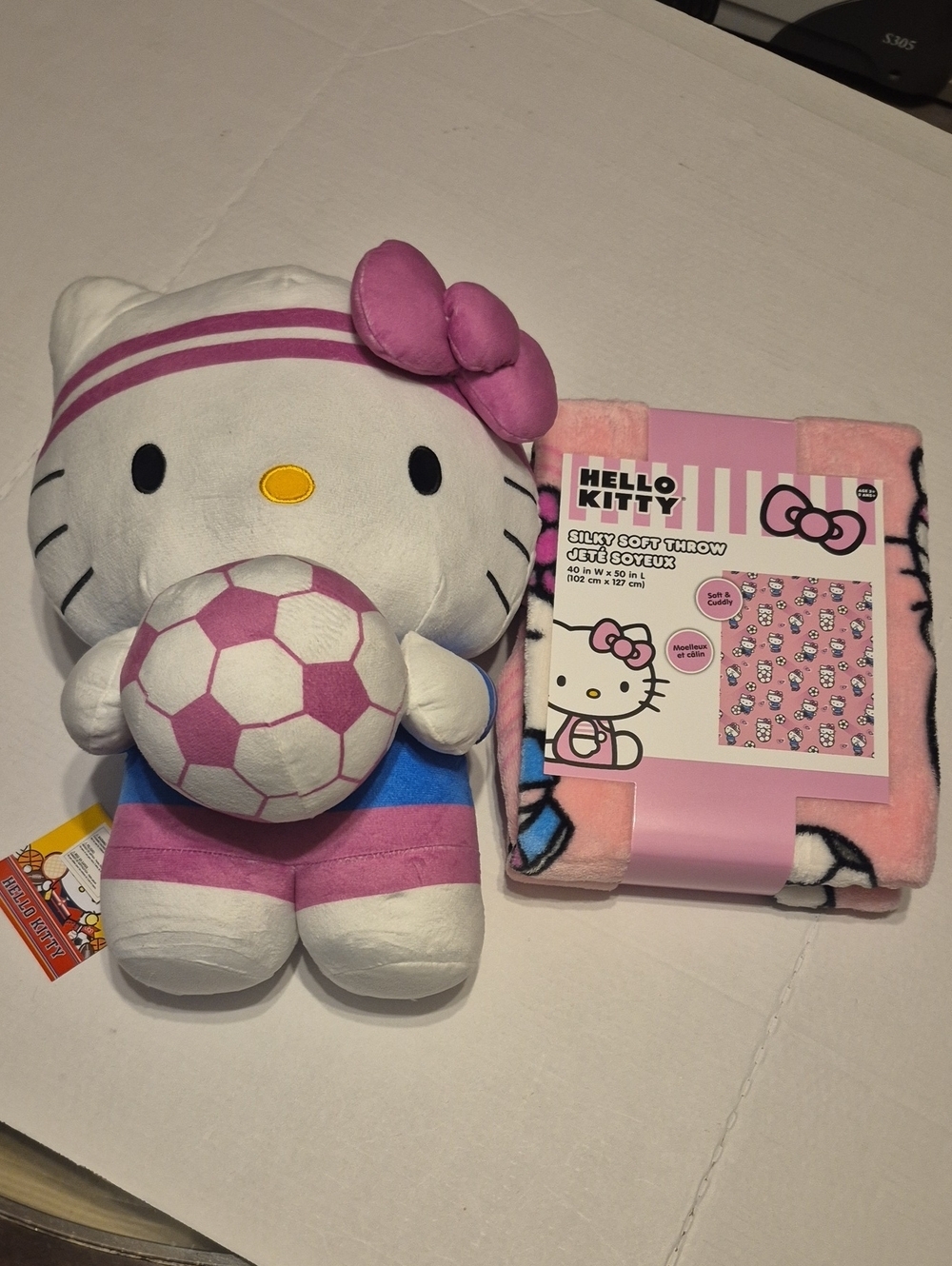 HELLO KITTY LARGE STUFFIE AND THROW BRAND NEW.